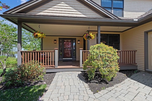 3 Osprey Ln, Newmarket, NH 03857 - doorway to property featuring a porch