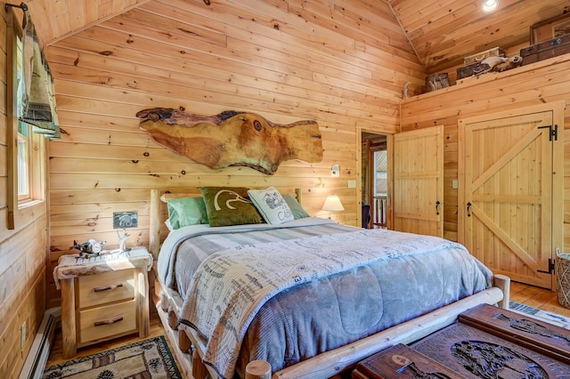 1481 Eaton Rd, Conway, NH 03813 - bedroom with lofted ceiling, a baseboard heating unit, wooden ceiling, wooden walls, and wood finished floors