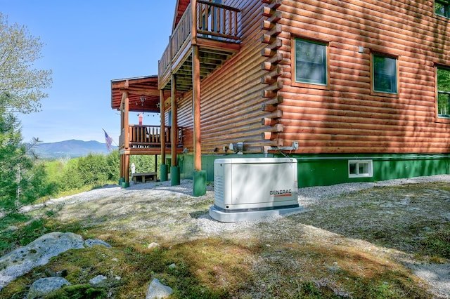 1481 Eaton Rd, Conway, NH 03813 - view of side of home with log siding and a mountain view
