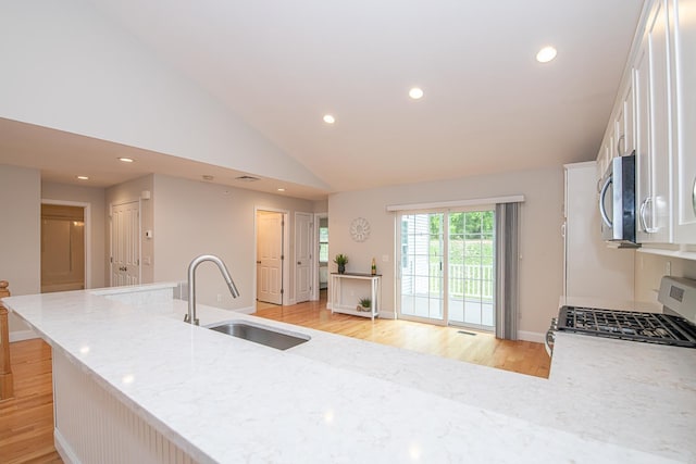 41 Winchester Dr, Hampstead, NH 03826 - kitchen featuring a sink, stainless steel appliances, light wood-style floors, white cabinetry, and recessed lighting