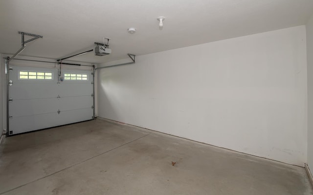 41 Winchester Dr, Hampstead, NH 03826 - garage featuring a garage door opener