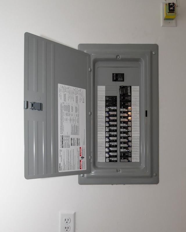 41 Winchester Dr, Hampstead, NH 03826 - utility room featuring electric panel