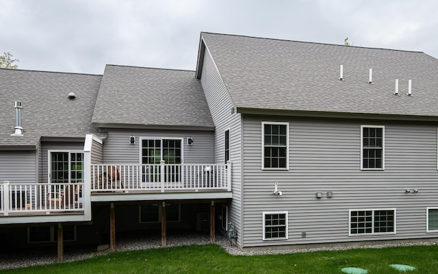 41 Winchester Dr, Hampstead, NH 03826 - rear view of house with a deck, roof with shingles, and a yard