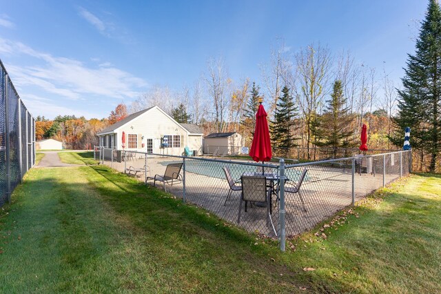 11 Sullivan Way Unit 6, Laconia, NH 03246 - view of swimming pool with a patio and an outbuilding