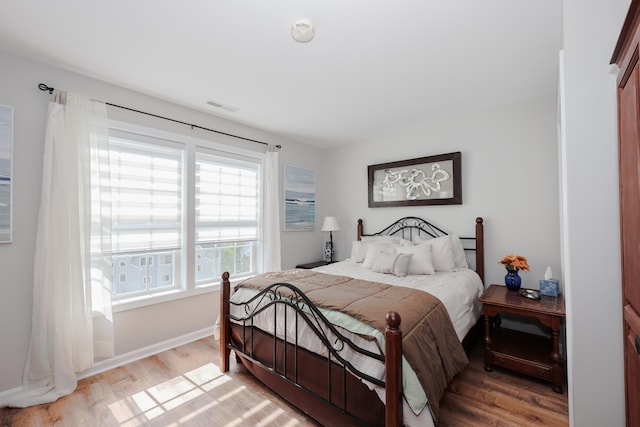 11 Sullivan Way Unit 6, Laconia, NH 03246 - bedroom featuring wood finished floors and baseboards