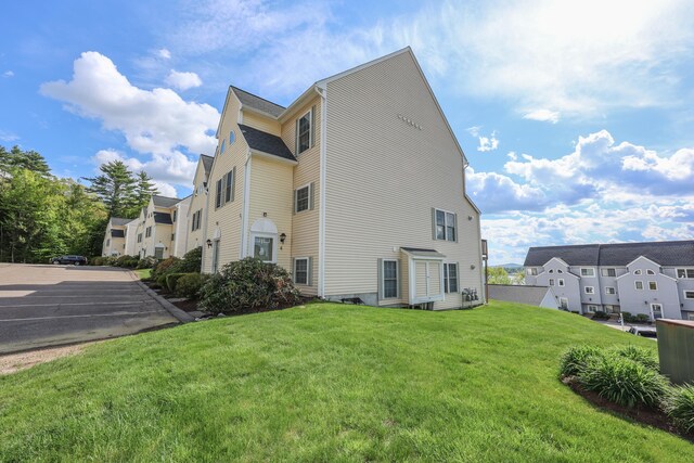 11 Sullivan Way Unit 6, Laconia, NH 03246 - view of property exterior featuring a yard