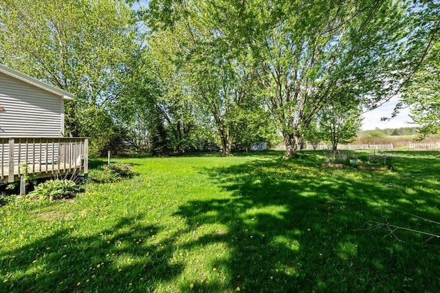 2099 W Shore Rd, Alburgh, VT 05440 - view of green lawn with a wooden deck