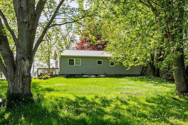 2099 W Shore Rd, Alburgh, VT 05440 - back of house with a yard, metal roof, and a wooden deck