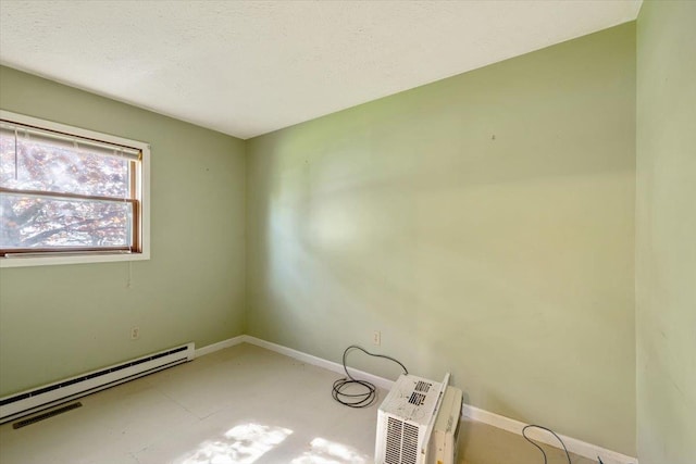 2099 W Shore Rd, Alburgh, VT 05440 - empty room with baseboards and a baseboard radiator