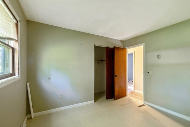 2099 W Shore Rd, Alburgh, VT 05440 - unfurnished bedroom featuring a closet and baseboards