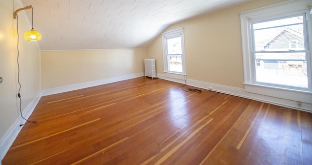 47 Pitkin St, Burlington, VT 05401 - bonus room featuring lofted ceiling, wood-type flooring, plenty of natural light, and baseboards