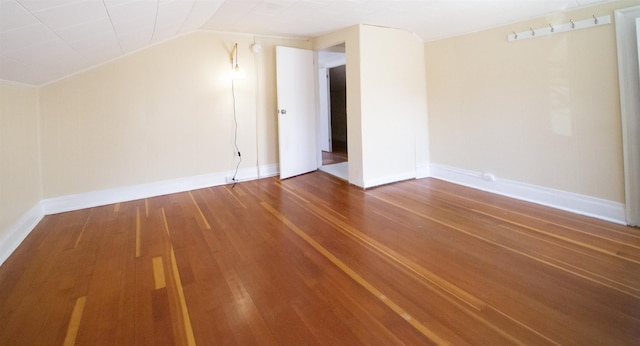 47 Pitkin St, Burlington, VT 05401 - bonus room with wood finished floors, baseboards, and vaulted ceiling