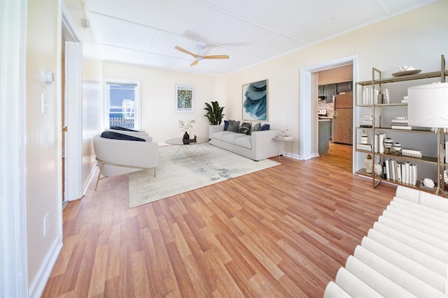 47 Pitkin St, Burlington, VT 05401 - living room with a ceiling fan, wood finished floors, and baseboards
