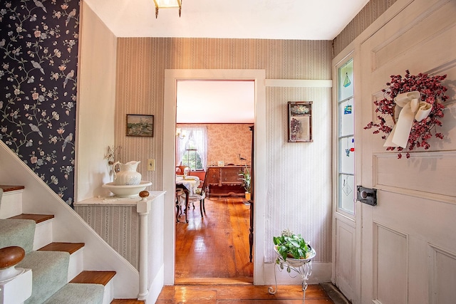 685 Abbot Hill Rd, Wilton, NH 03086 - entryway featuring wallpapered walls, hardwood / wood-style flooring, stairway, and baseboards