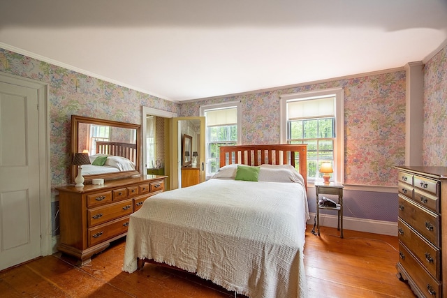 685 Abbot Hill Rd, Wilton, NH 03086 - bedroom featuring wallpapered walls, light wood-type flooring, and ornamental molding