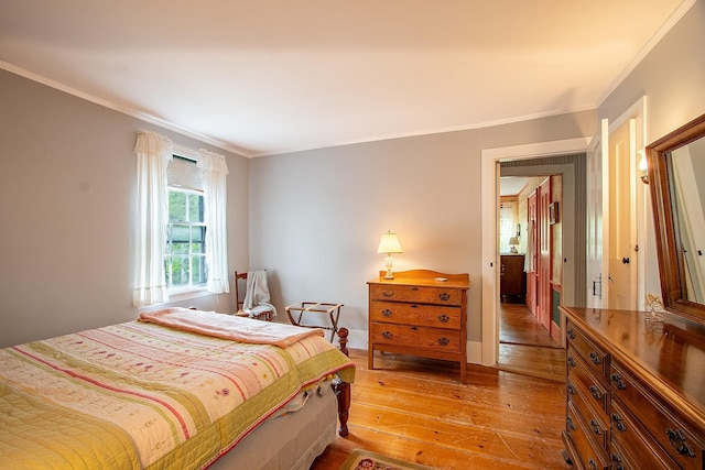 685 Abbot Hill Rd, Wilton, NH 03086 - bedroom with light wood-style floors and crown molding