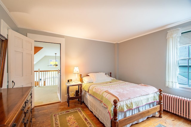 685 Abbot Hill Rd, Wilton, NH 03086 - bedroom featuring radiator heating unit, hardwood / wood-style flooring, and ornamental molding
