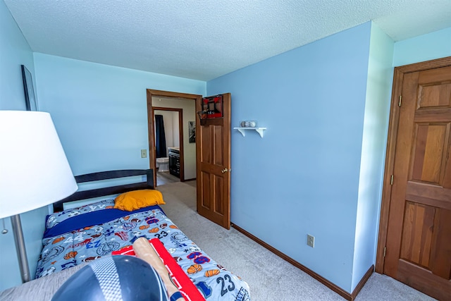 bedroom featuring carpet floors and baseboards