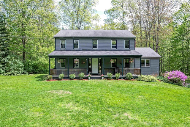 view of front of property with a porch and a front yard