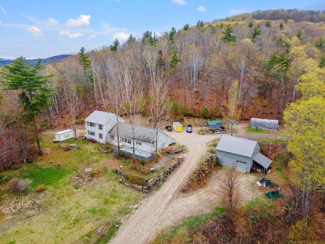 28 Lindsley Cir, Campton, NH 03223 - aerial view of property and surrounding area featuring a heavily wooded area