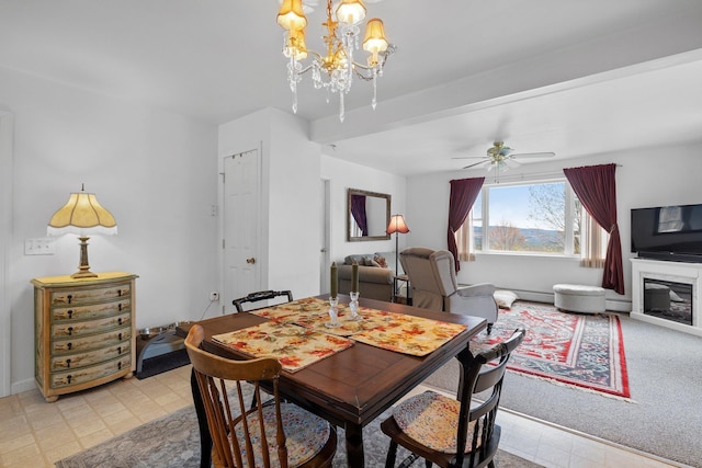 28 Lindsley Cir, Campton, NH 03223 - dining area featuring a chandelier, light floors, and ceiling fan