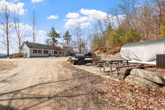 28 Lindsley Cir, Campton, NH 03223 - view of dirt / gravel driveway