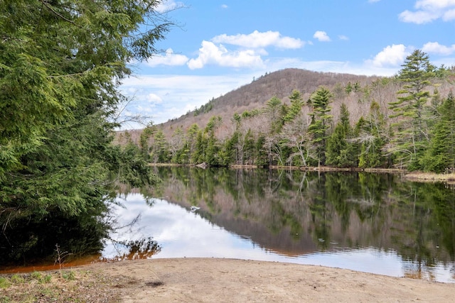28 Lindsley Cir, Campton, NH 03223 - water view featuring a forest and a mountainous background