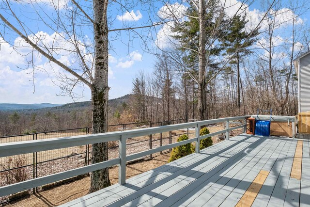 28 Lindsley Cir, Campton, NH 03223 - wooden deck with a covered hot tub and a mountain view