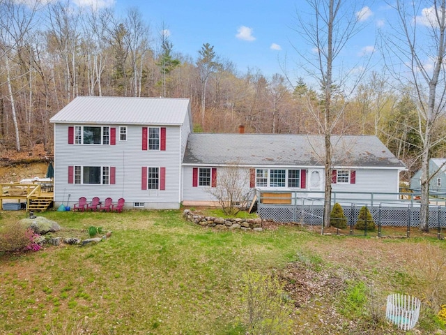 28 Lindsley Cir, Campton, NH 03223 - view of front of property featuring a wooden deck and a front lawn