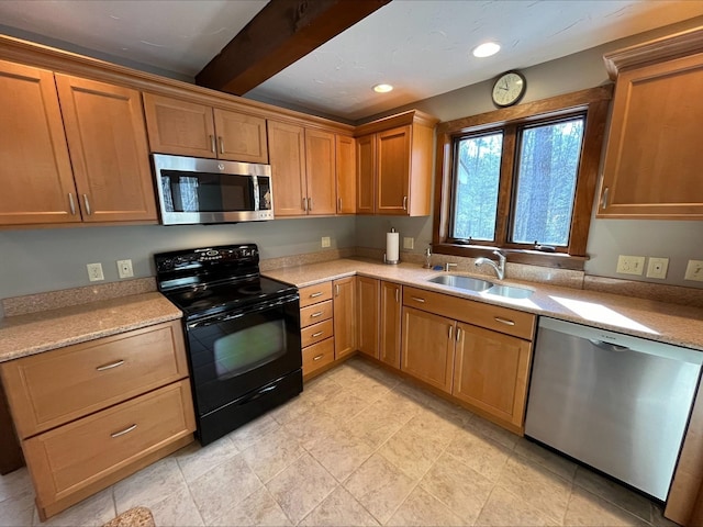 80 Mill St, Conway, NH 03813 - kitchen featuring appliances with stainless steel finishes, a sink, recessed lighting, brown cabinets, and beam ceiling