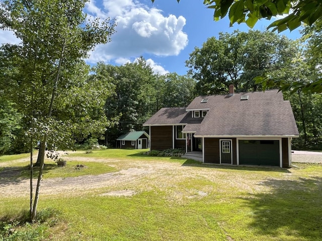 80 Mill St, Conway, NH 03813 - back of property with a lawn, an attached garage, a porch, roof with shingles, and a chimney
