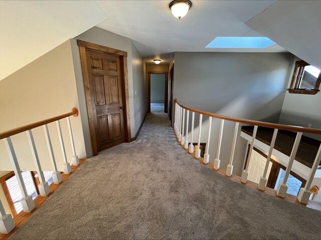 80 Mill St, Conway, NH 03813 - hall with an upstairs landing, carpet flooring, a skylight, and plenty of natural light