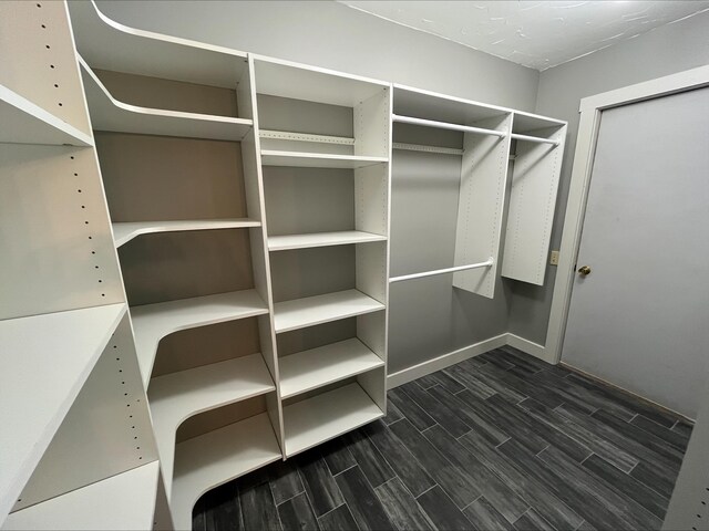 80 Mill St, Conway, NH 03813 - walk in closet featuring wood finish floors