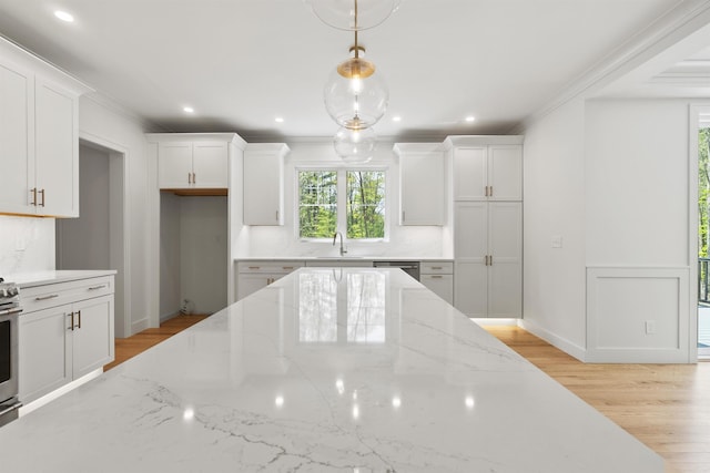286 S Rd, Brentwood, NH 03833 - kitchen with backsplash, ornamental molding, white cabinets, light wood finished floors, and recessed lighting