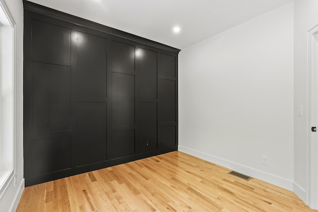 286 S Rd, Brentwood, NH 03833 - unfurnished bedroom with light wood-style floors, a closet, and recessed lighting