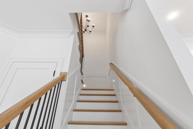 286 S Rd, Brentwood, NH 03833 - staircase featuring a chandelier
