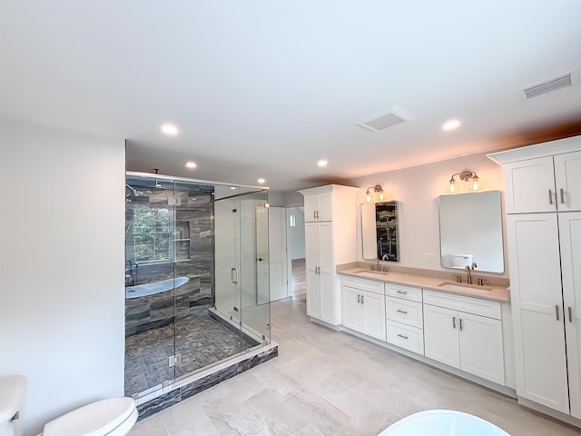286 S Rd, Brentwood, NH 03833 - full bathroom with double vanity, recessed lighting, and a stall shower