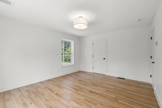 286 S Rd, Brentwood, NH 03833 - unfurnished room with light wood-type flooring and a smoke detector