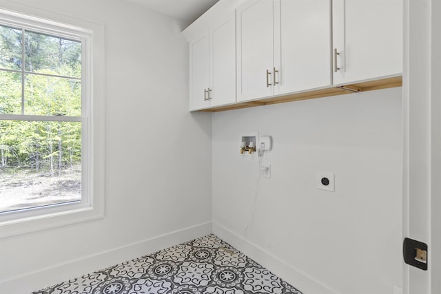 286 S Rd, Brentwood, NH 03833 - laundry room featuring electric dryer hookup, cabinet space, washer hookup, and tile patterned floors