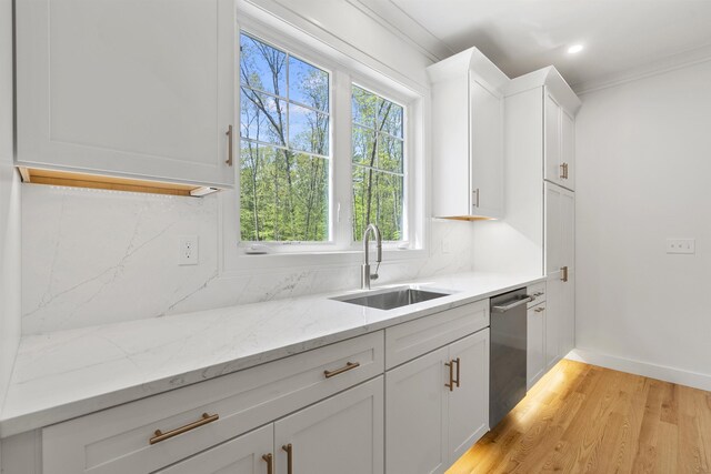 286 S Rd, Brentwood, NH 03833 - kitchen featuring dishwasher, crown molding, tasteful backsplash, light wood finished floors, and white cabinets