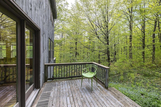 258 Densmore Hill Rd, Hartland, VT 05048 - wooden terrace featuring a forest view