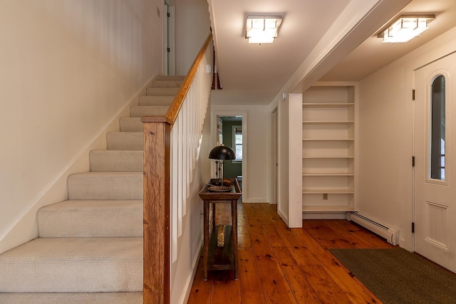 258 Densmore Hill Rd, Hartland, VT 05048 - entryway with a baseboard radiator, hardwood / wood-style floors, and stairway