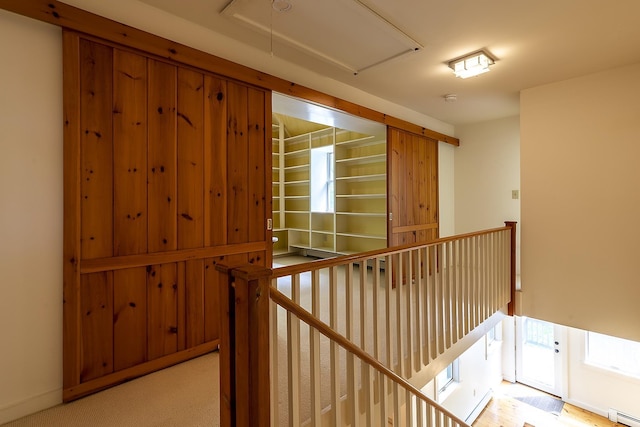 258 Densmore Hill Rd, Hartland, VT 05048 - hall featuring attic access, a baseboard radiator, and an upstairs landing