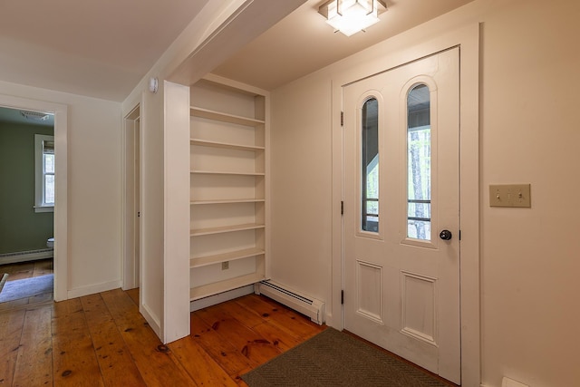 258 Densmore Hill Rd, Hartland, VT 05048 - entryway with a baseboard radiator and wood-type flooring