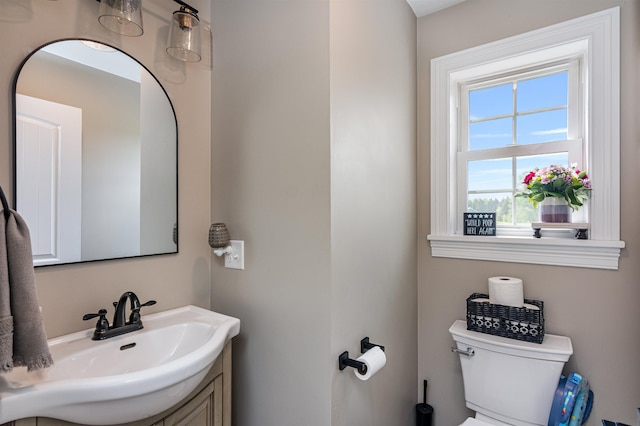 499 Cook Rd, Sheldon, VT 05483 - half bathroom featuring toilet and vanity