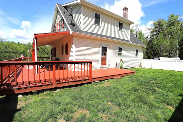 412 Covered Bridge Rd, Irasburg, VT 05845 - back of property featuring a deck, a chimney, and a shingled roof