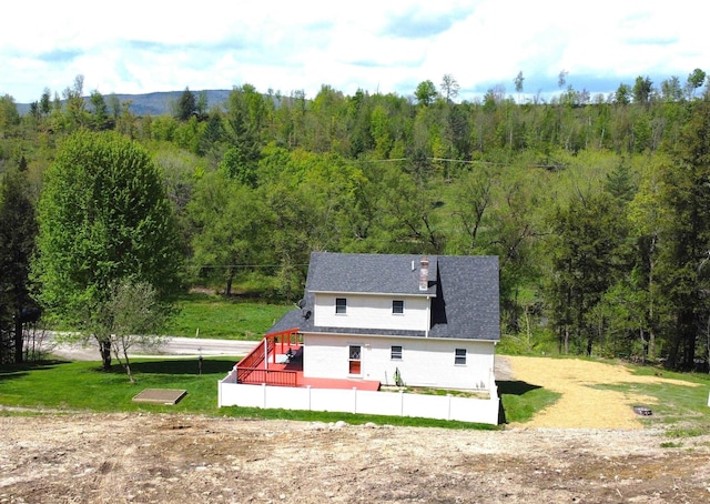 412 Covered Bridge Rd, Irasburg, VT 05845 - back of property featuring a wooded view and fence