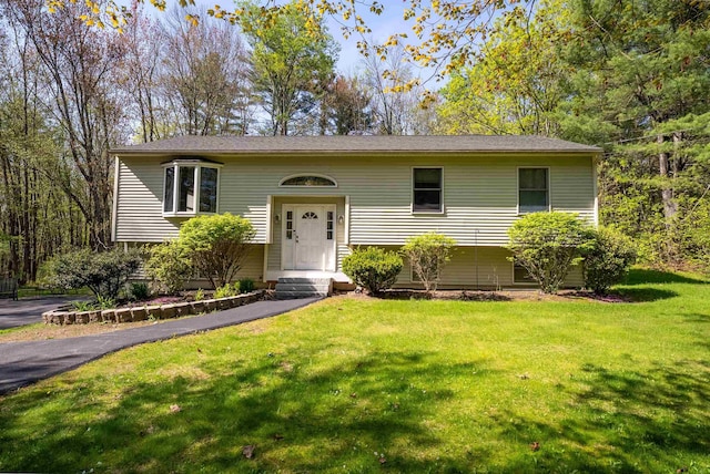 175 Blackwater Rd, Somersworth, NH 03878 - raised ranch with a front lawn