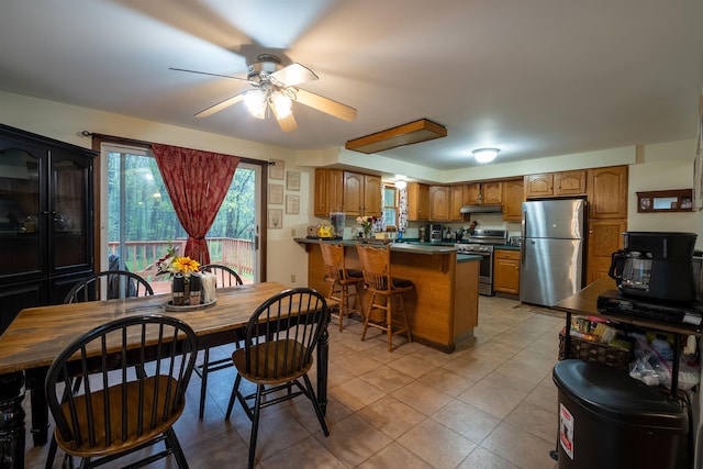 175 Blackwater Rd, Somersworth, NH 03878 - dining room with a ceiling fan and light tile patterned floors