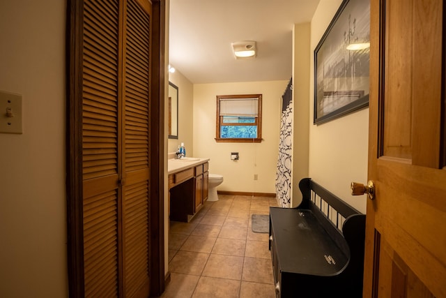 175 Blackwater Rd, Somersworth, NH 03878 - full bath with a closet, toilet, tile patterned flooring, vanity, and baseboards